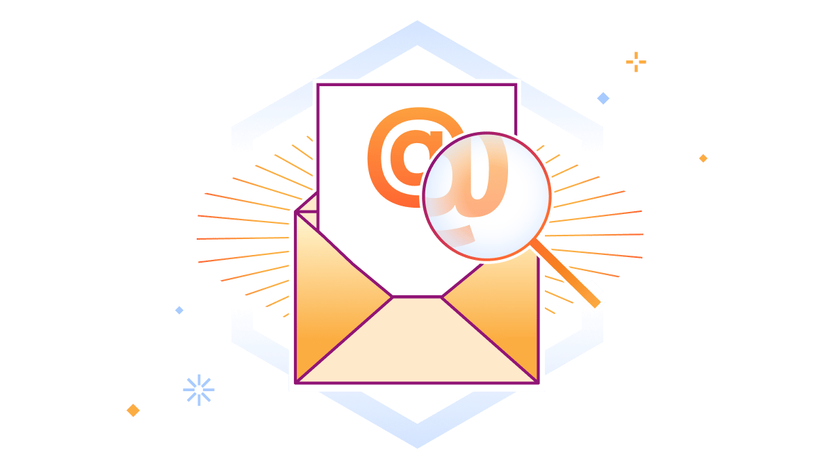 Signo de arroba del correo electrónico ampliado con una lupa